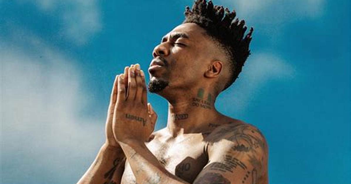 Canadian Rapper Dax Makes Tattoo of Nigeria Flag on His Neck