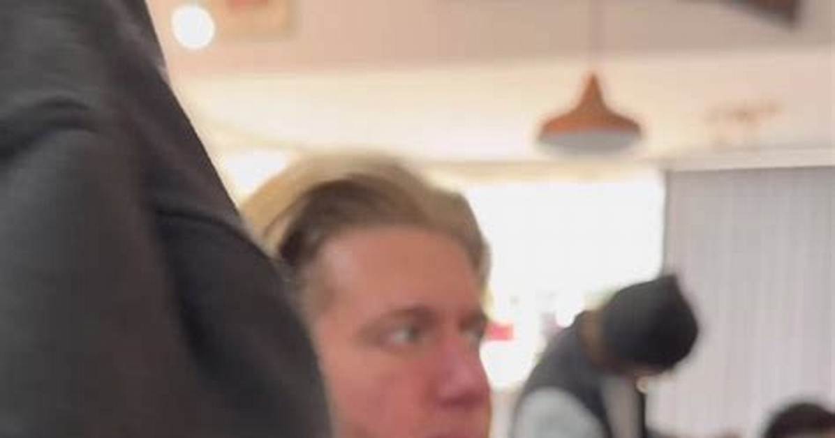 Reactions as Photos from Barbering Shop Where Ladies Sit on the Laps of Male Customers to Serve Them Hit Online